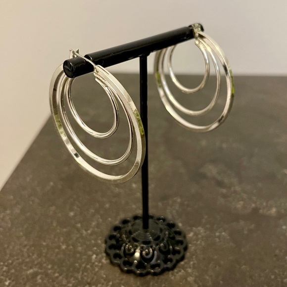 1.5” silver triple hoop earrings by Nine West